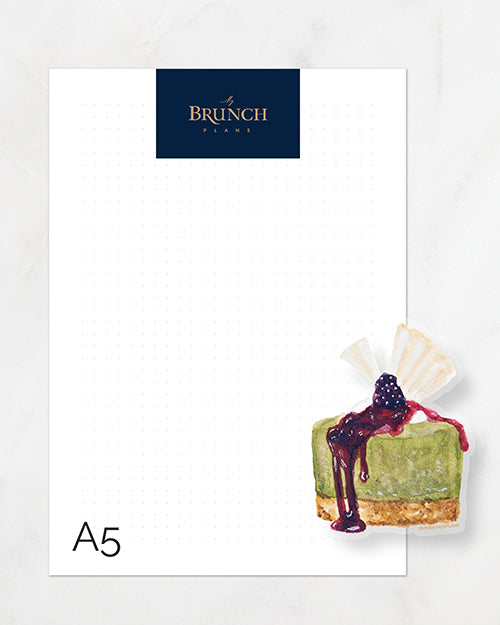 My Brunch Plans’ hand painted gouache matcha cheesecake with blackberry compote and white chocolate topper diecut vinyl sticker size comparison to a A5 paper