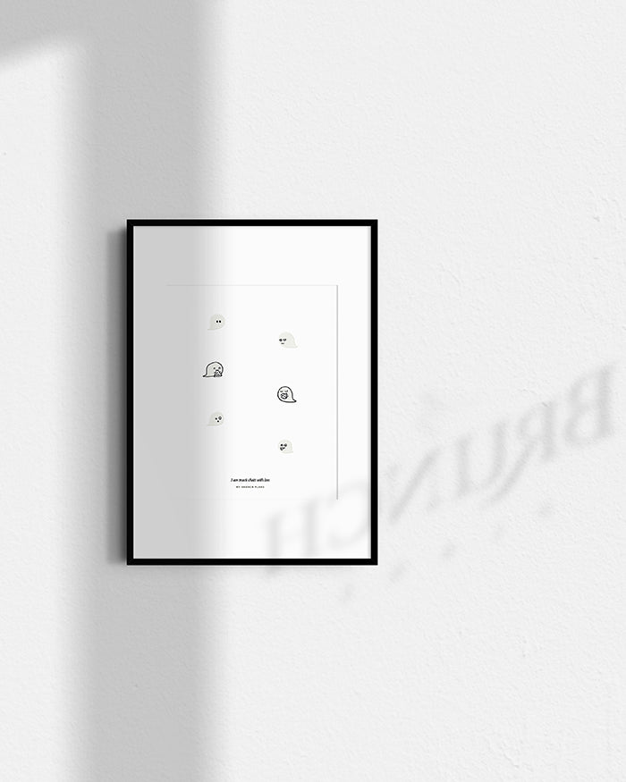 Framed black and white artwork on a white wall