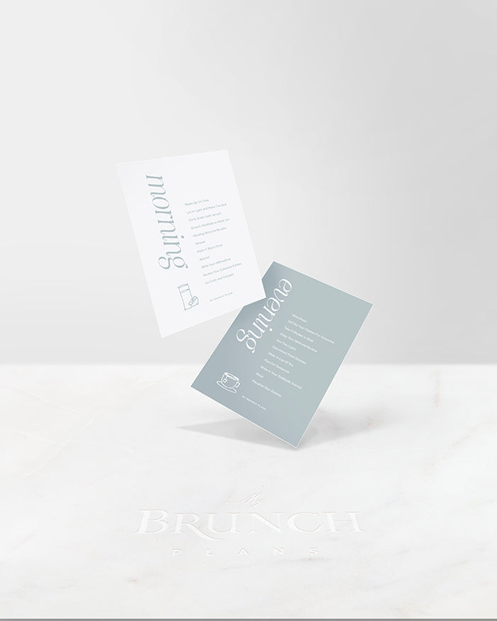 My Brunch Plans' planner card set of two. One is a morning routine suggestion with a hand drawn line art of lemon water with a white background and blue text. The evening routine card has hand drawn line art of a cup of tea with the same blue but as the background.