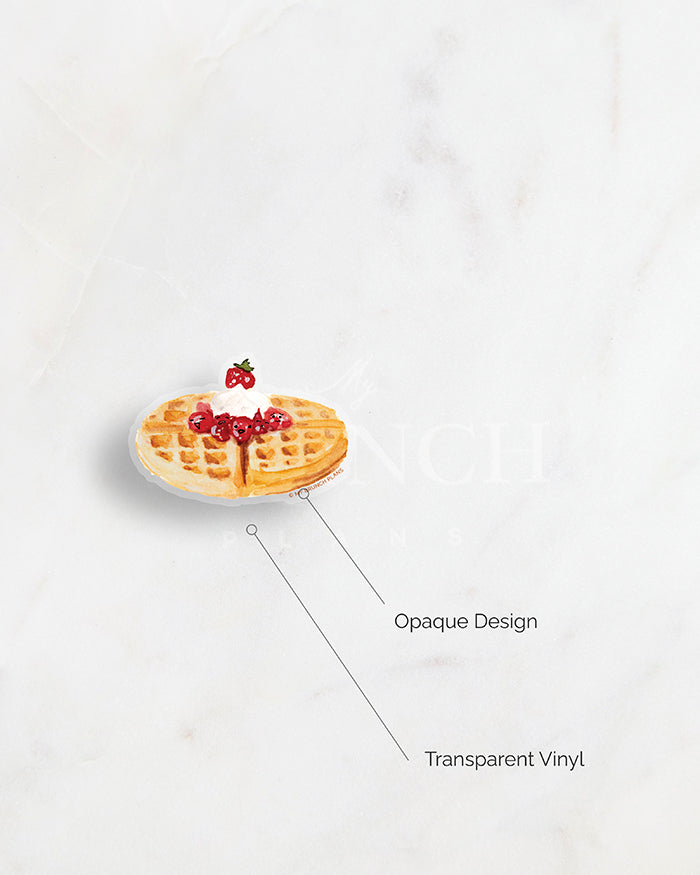 a diagram of My Brunch Plans' hand painted in gouache American Waffle with smiley strawberries and cream diecut sticker showing the design is opaque printed on a matte transparent waterproof vinyl.
