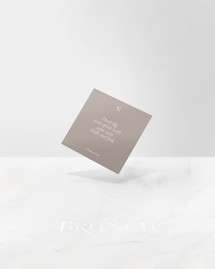 My Brunch Plans' planner card with the phrase "Don't dig your grave with your own knife and fork" and a small hand drawn line art of fork and knife on top.