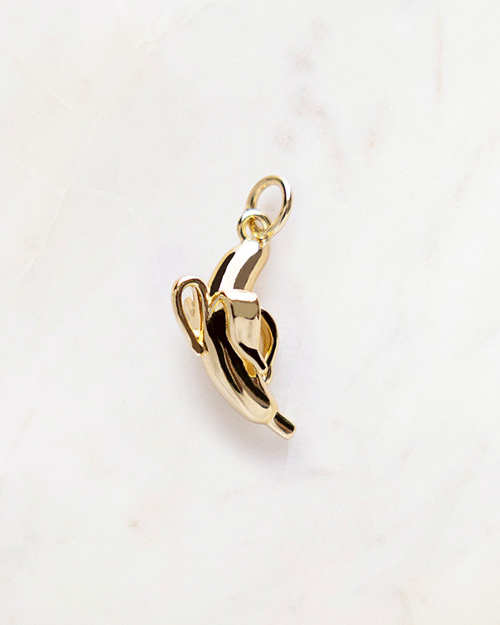 My Brunch Plans'  Banana Charm | 18k Gold Plated on a marble background, perfect for planners, notebooks and more.